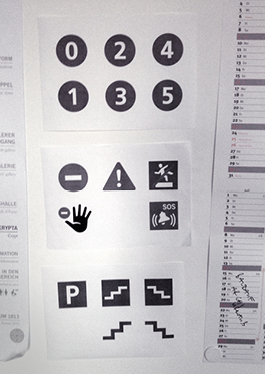 The pictograms were printed out during the working process for closer inspection and pinned to the wall.