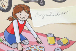 Close-up of an illustration of a girl with a correction slip on it