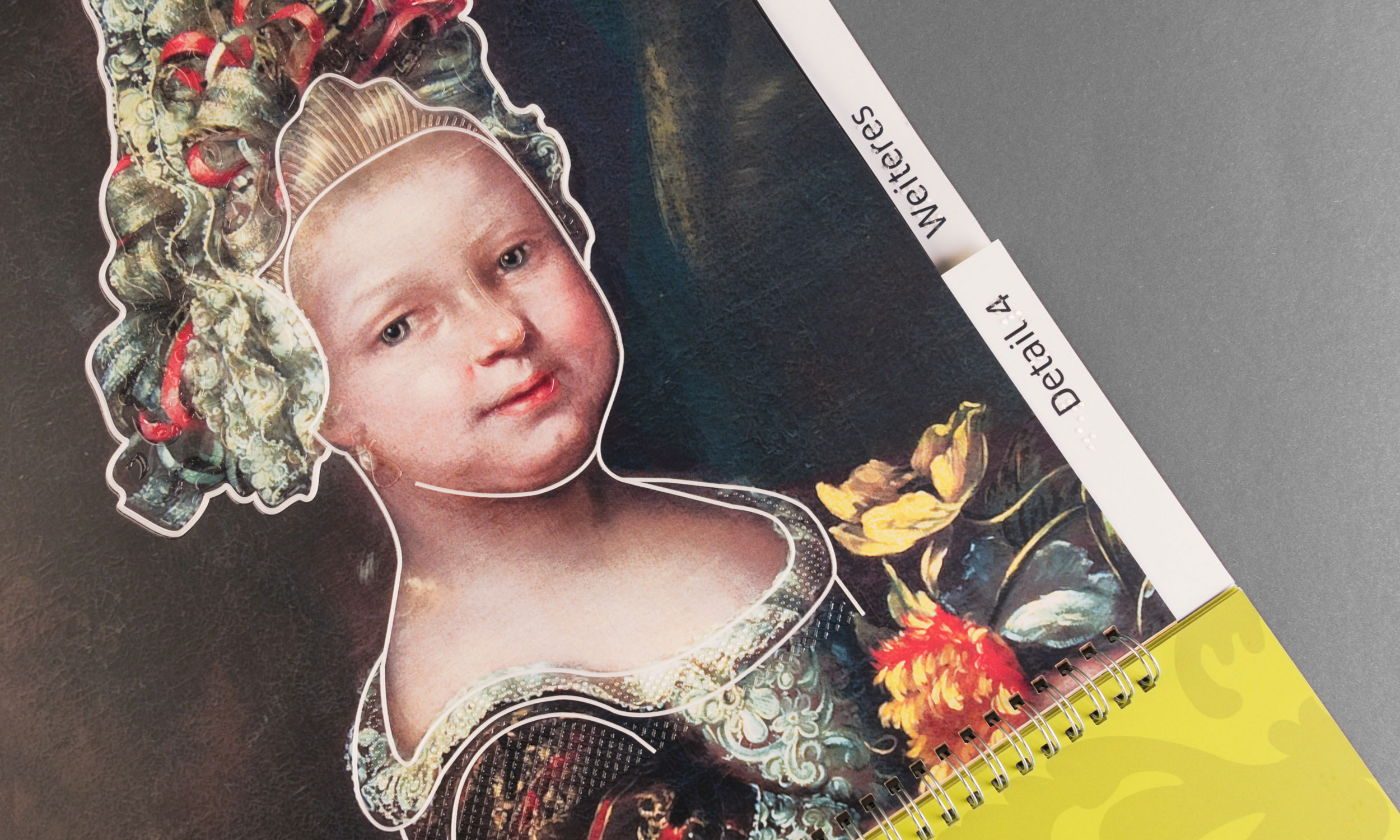 Detail photo with close-up view of the "Little Princess" on the title of the tactile accompanying booklet