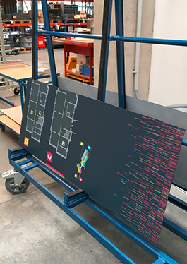 Photo of one of the orientation boards on a rolling pallet in the manufacturer's factory
