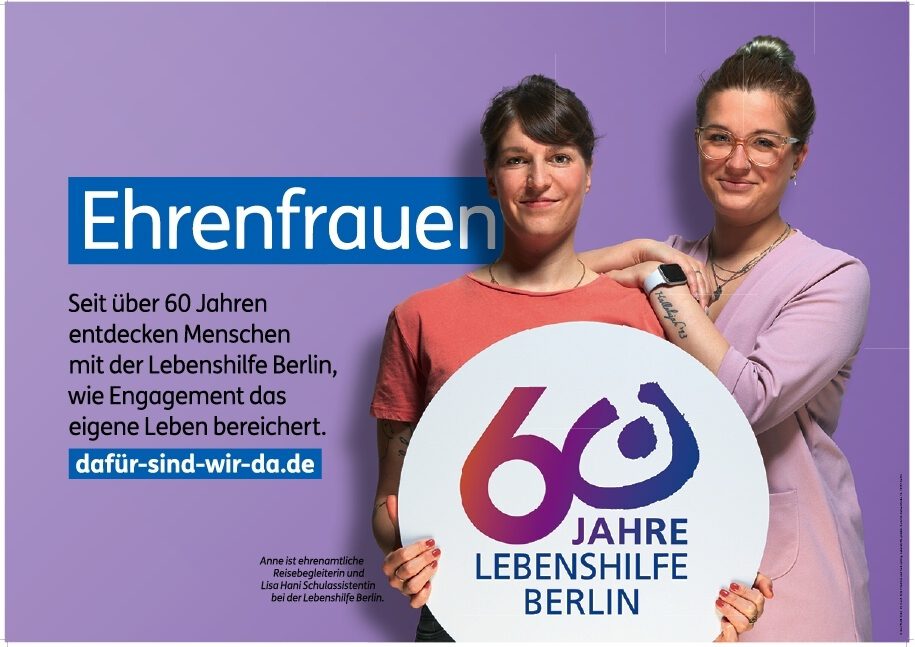 Picture of the large-surface motif "Ehrenfrauen" showing two women with the anniversary logo who are working at Lebenshilfe