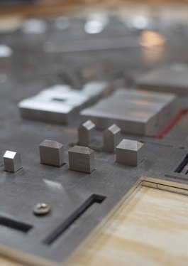 Detailed view of the miniature metal buildings