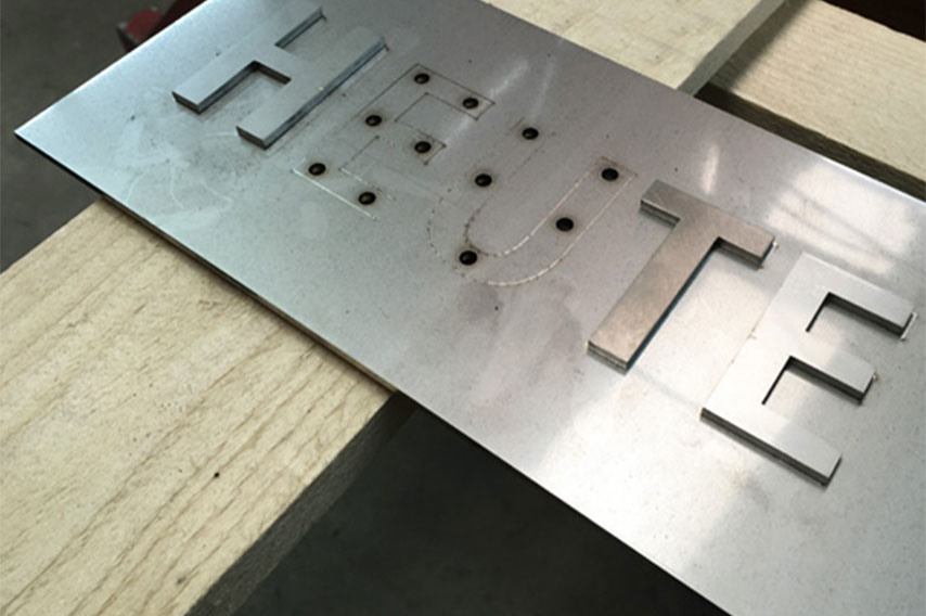 View of a metal plate with the Today lettering