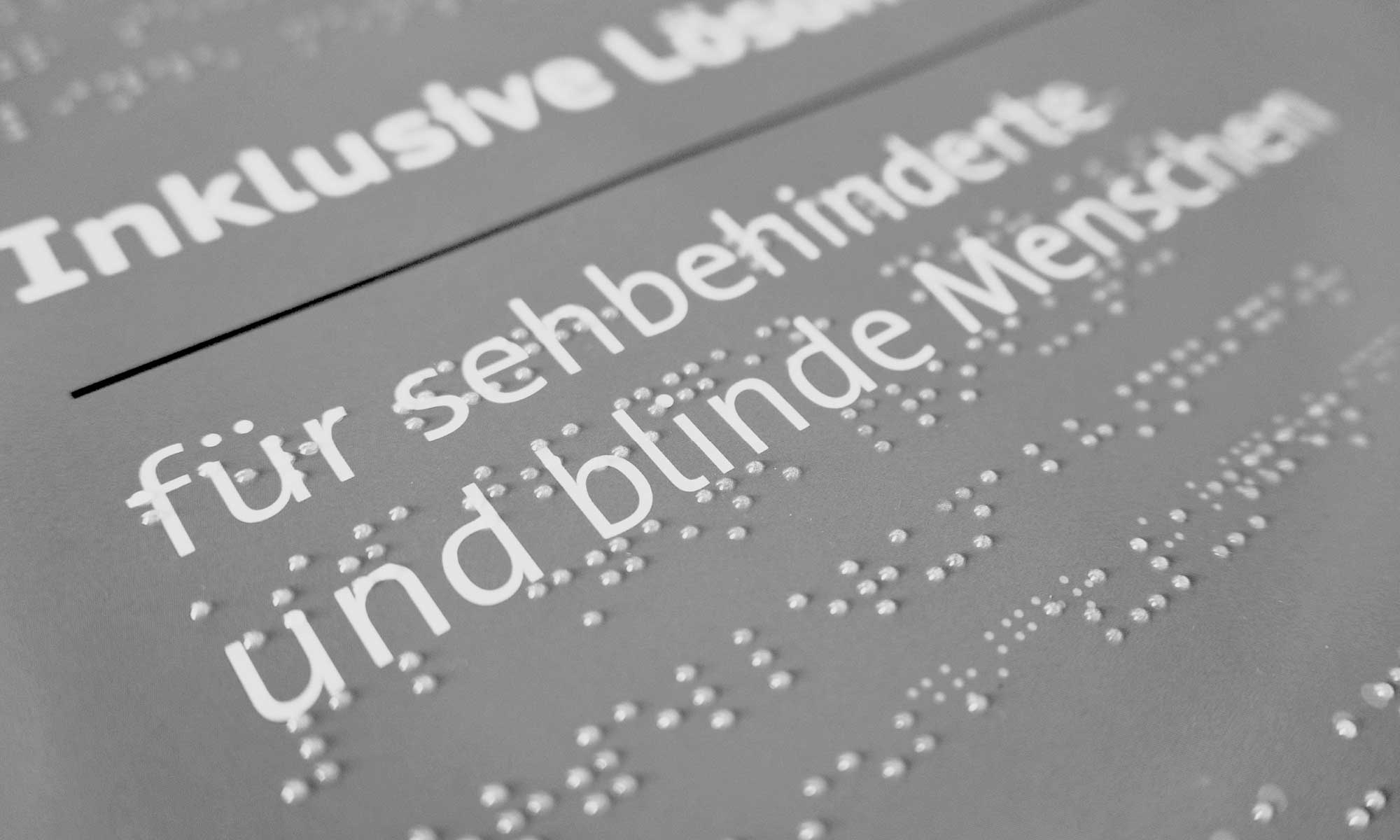 Photo for the next project: Close-up of an envelope with black lettering and transparent braille